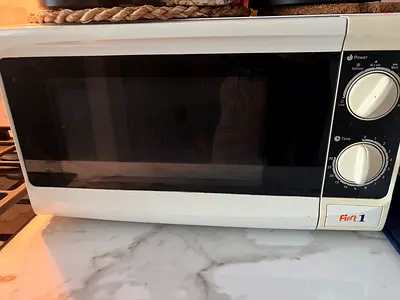 My compact white countertop microwave - working