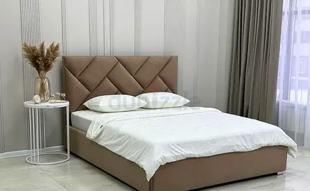 New beige upholstered bed with diamond headboard