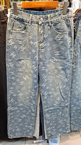 Chanel womens wide-leg printed denim jeans