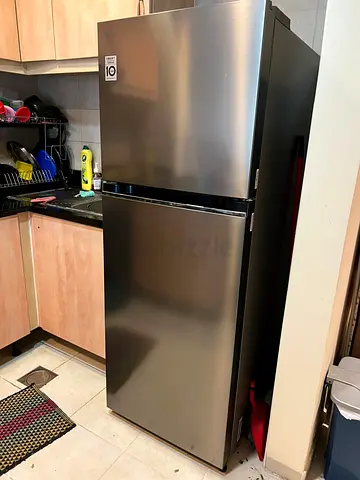 Stainless Steel Top-Freezer Refrigerator - Good Condition