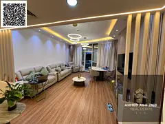 Two bedrooms and a fully furnished living room with three bathrooms, a storage room, a gym, a swimmi