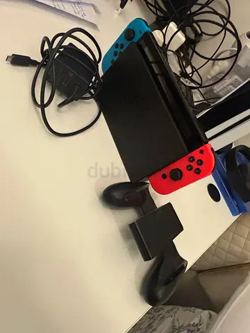 Nintendo Switch with Neon Joy-Cons, Dock, Charger and Pro Controller