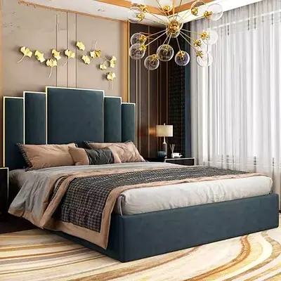 king-size velvet upholstered bed with tall paneled headboard