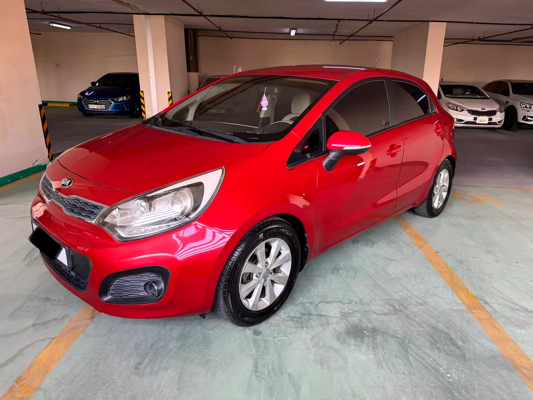 Kia Rio 2014 — photo 1 of 10