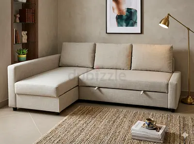 Beige L-shaped sectional sofa with  storage chaise — comfortable