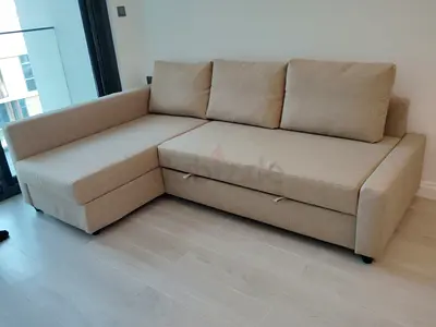 Beige L-shaped Sofa bed with  Storage Condition)