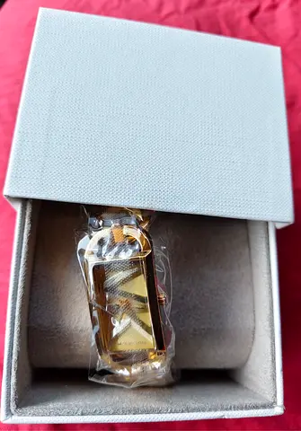 My gold-tone rectangular womens watch — unworn, in box