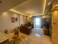 Luxury 2BR in Al Majaz 2, hotel-style furnishing, free parking, gym &amp; pool, balcony with open ci