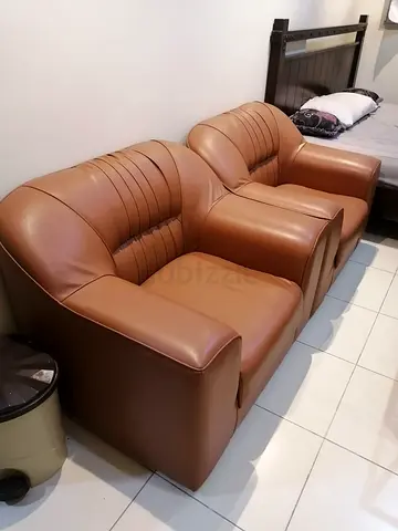 Set of 2 brown leather armchairs