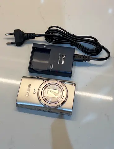 Canon IXY compact digital camera with charger - Silver