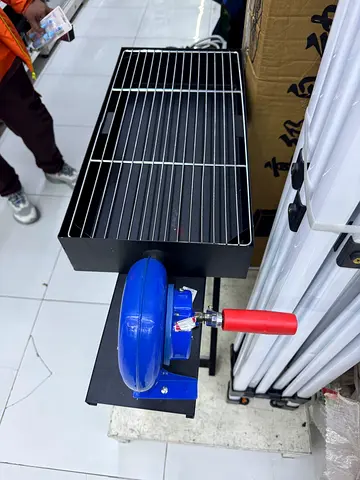 Portable folding charcoal BBQ grill with stand