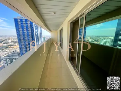For annual rent: Two-bedroom apartment in Al Rashidiya 3, directly on Khalifa Street. Free air conditioning, built-in wardrobes, open view, 3 balconie