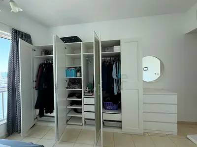 Brand new king size bed with My white 4-door wardrobe with built-in shelves and matching dresser