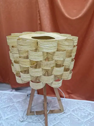Wooden tripod table lamp with woven rattan shade