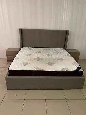 My grey upholstered bed