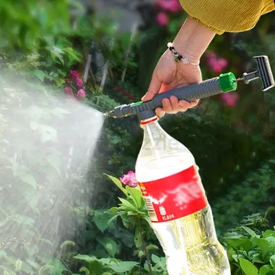 Handheld bottle garden sprayer — portable plant watering nozzle