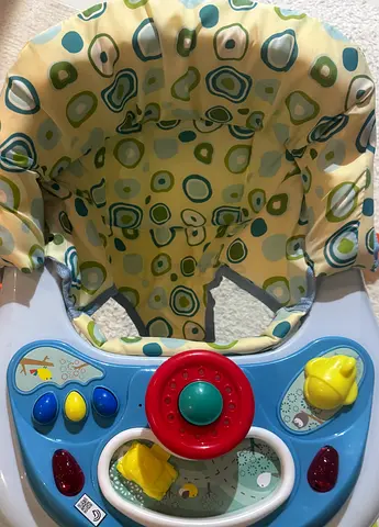 Gently used baby activity walker with toy tray