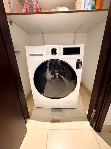 Front-load washer/dryer - well maintained, working condition. Bought new.