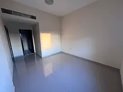 New one-bedroom apartment for annual rent in Al Rawda 1, Ajman. Two bathrooms, master bedroom, spaci