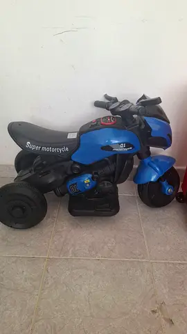 Used blue toddler electric ride-on motorcycle — working condition