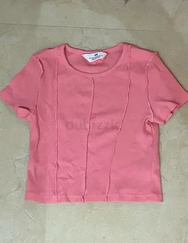 Pink short-sleeve knit top - size 8/10 years old
