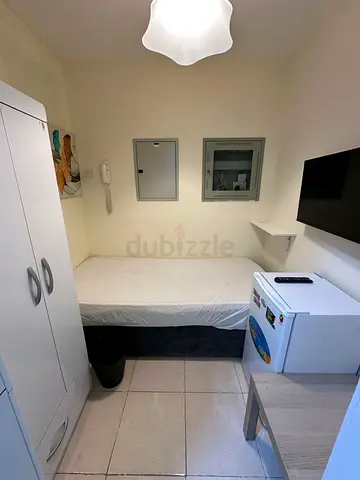 Available soundproof new single partition with smart tv and fridge in sports city