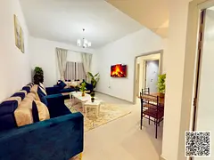 For monthly rent: Luxurious furnished one-bedroom apartment with a living room, in Ajman Corniche. I