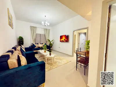 For monthly rent: Luxurious furnished one-bedroom apartment with a living room, in Ajman Corniche. Includes all bills and internet.