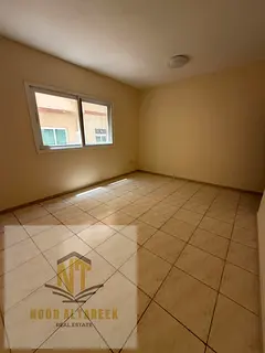 A spacious apartment for rent in Al Qasimia (Al Nad), featuring 2 bedrooms, including a master bedro