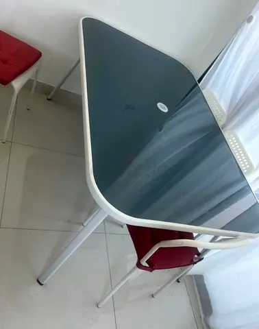 Glass-Top Table with Metal Frame