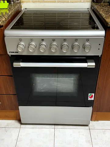 Used stainless freestanding 4-burner gas cooker with oven
