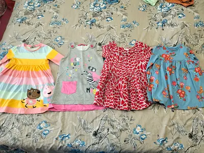 All for 50 AED 4 beautiful branded kids dresses for 3-4 years old on perfect condition