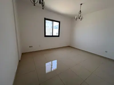 One bedroom and living room in Al Alia, prime location close to all services, easy access to Dubai and Sharjah roads.