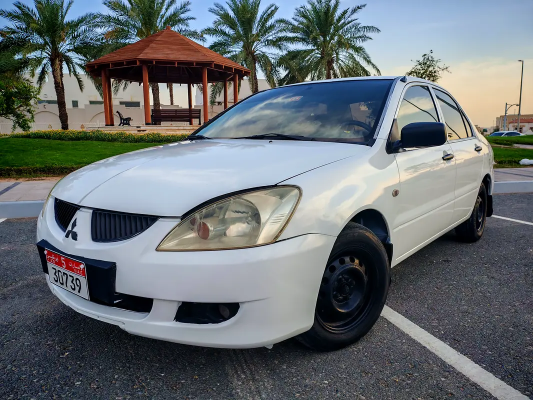 Mitsubishi Lancer 2004 — photo 1 of 17