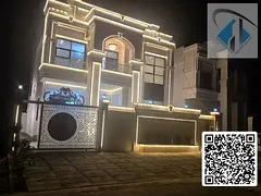 A luxurious independent classic villa with a natural stone façade, located in Al Helio 1 – Ajman.