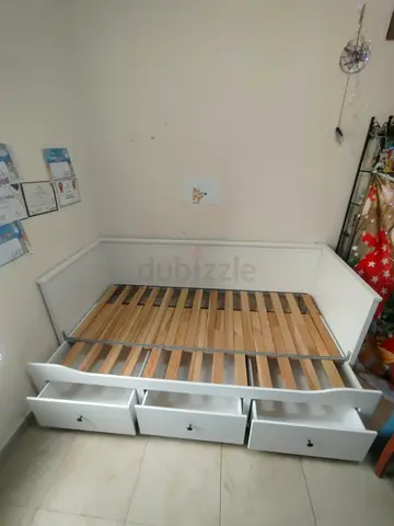 IKEA hamnes day bed with 3 big storage drawers underneath and with 2 IKEA mattresses is available