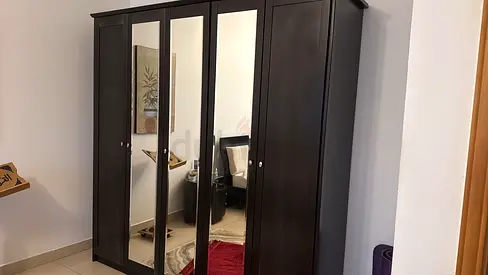 My 4-door dark wood wardrobe with mirrored doors Home Center — good condition