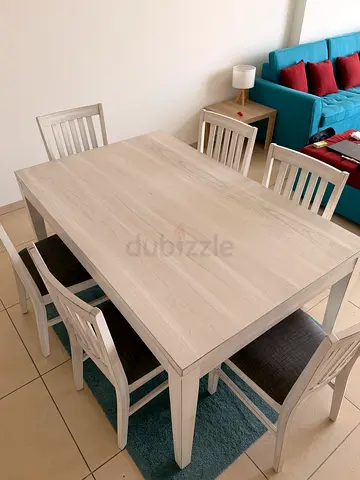 Stylish White Dining Table with Chairs