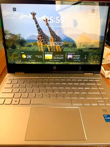 HP Pavillion x360 convertible laptop with touchscreen display and fingerprint access