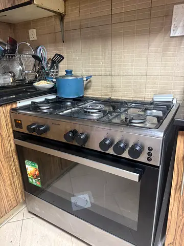 5-burner stainless steel gas stove with oven - used