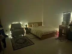 Ladies only,Furnished Master Room with balcony and Gym for one lady in the center of Abu Dhabi