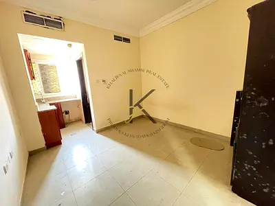 🌟 Spacious Unfurnished Studio | Central AC | 440 Sqft | Comfortable Living in Muwailah – Sharjah 🏡❄️✨