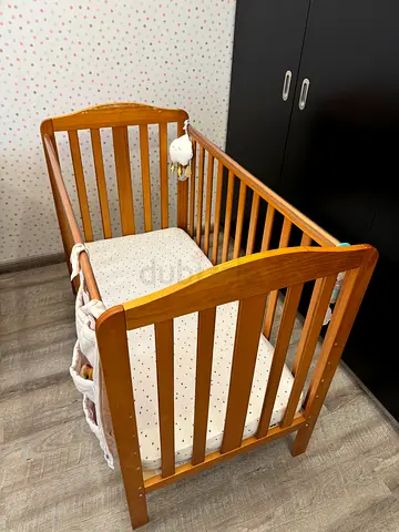 Baby cot bed with mattress