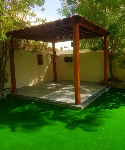 Elegant Outdoor Pergola with Artificial Grass Base