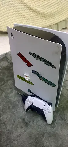 PlayStation 5 console with DualSense controller (used, stickered)+cartoon