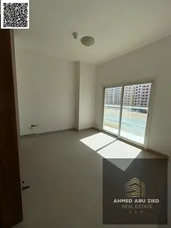 Two bedrooms and a spacious living room in a new building, first occupancy, with three bathrooms, am