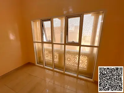 For Rent in Al Mowaihat 3 A spacious 1-bedroom apartment with a separate living room, featuring 2 bathrooms and a closed (separate) hall layout. The