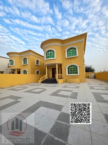 Villa for sale in the Al Muweihat area in Ajman, modern design, ground floor, first floor, and rooftop (5 master bedrooms, majlis, hall, and maid's ro