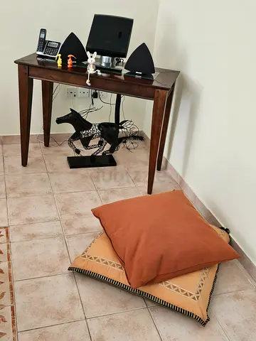 Wooden Table with Cushions