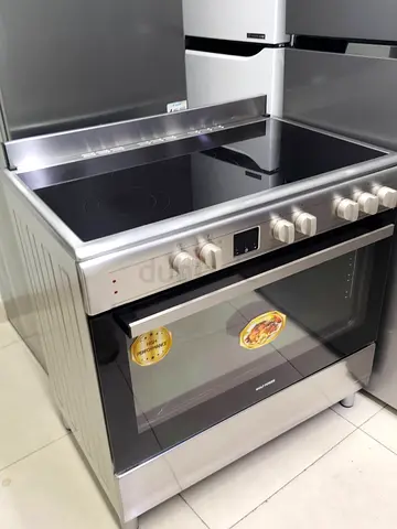 Stainless steel electric range with ceramic hob and oven (used, good condition)